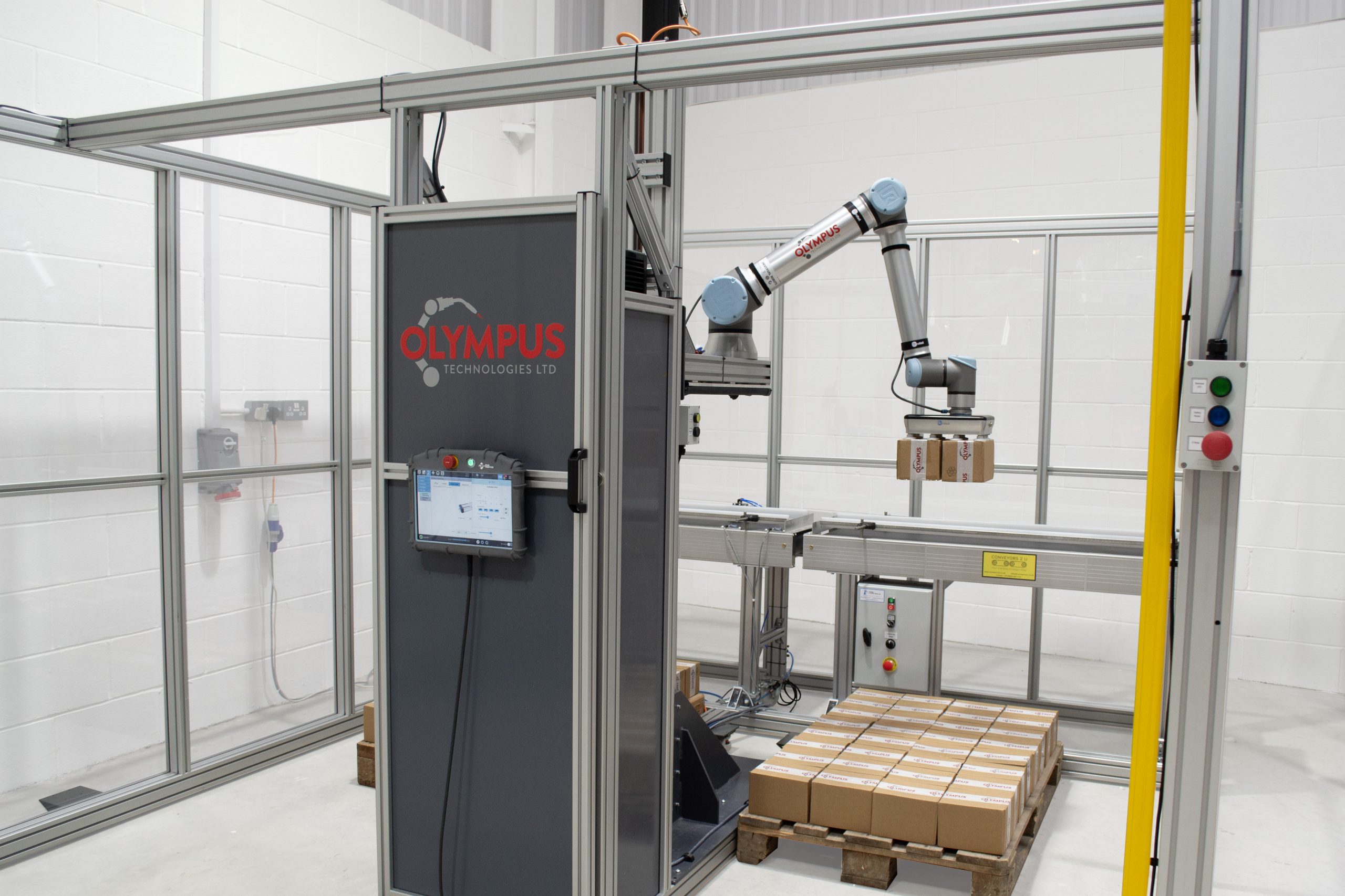 The Olympus UR20 Palletising System offers the smallest footprint cell whilst enabling the robot to safely palletise at its maximum cycles per minute.