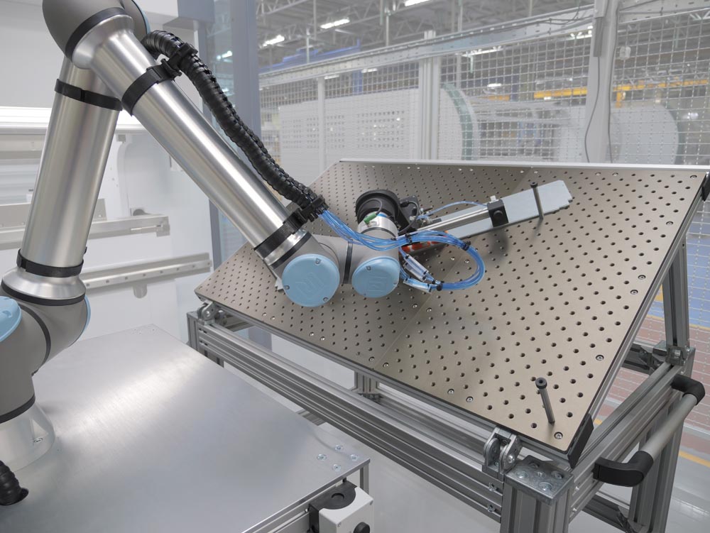 Olympus Technologies has developed a standard cobot press brake tending solution, which enables a batch of parts to be manufactured through your press brake without human interaction.